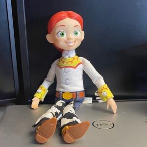 Disney/Pixar talking Josie Doll w/Red Hair & Yellow white fabric cowhide chaps.